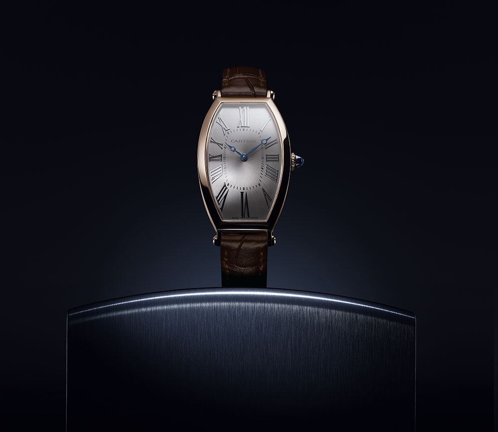 reloj Cartier Tonneau Modelo Grande Horas y Minutos oro rosa